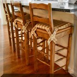 F28. Set of three rush seat French provincial bar stools. 42”h 
